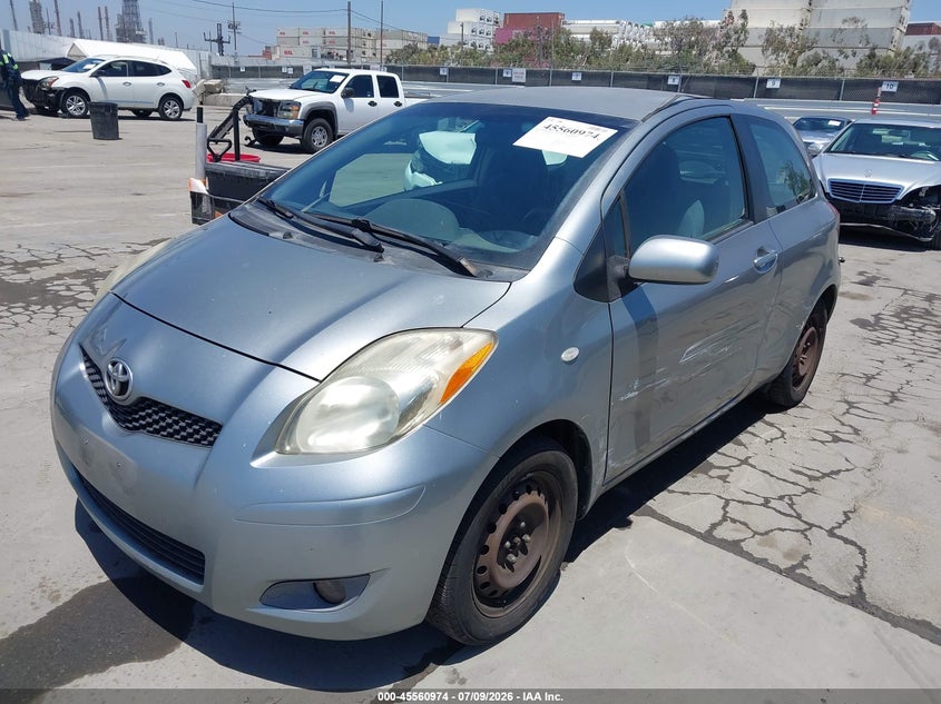2009 Toyota Yaris VIN JTDJT903495222986 IAAI salvage auction — SIDE, Salvage (California), sold $1,075 on 2026-07-22 (photo 6)