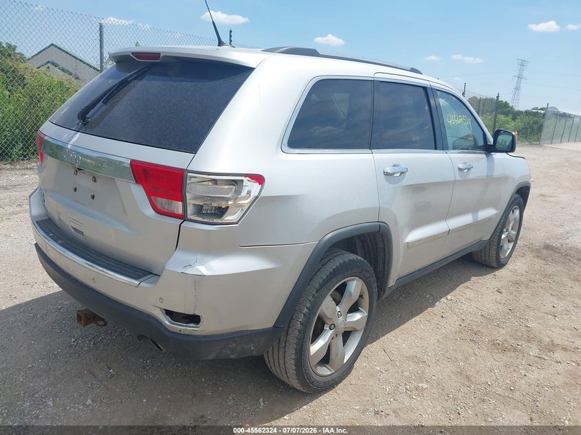 2011 Jeep Grand cherokee VIN 1J4RR6GG4BC517817 IAAI salvage auction — NORMAL WEAR, Clear (Wisconsin), sold $850 on 2026-07-18 (photo 4)