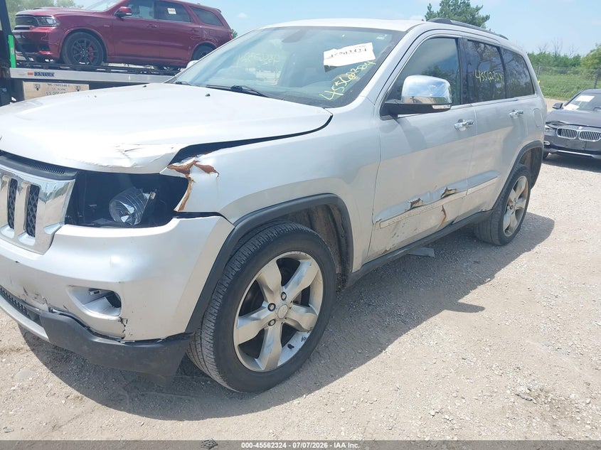 2011 Jeep Grand cherokee VIN 1J4RR6GG4BC517817 IAAI salvage auction — NORMAL WEAR, Clear (Wisconsin), sold $850 on 2026-07-18 (photo 6)