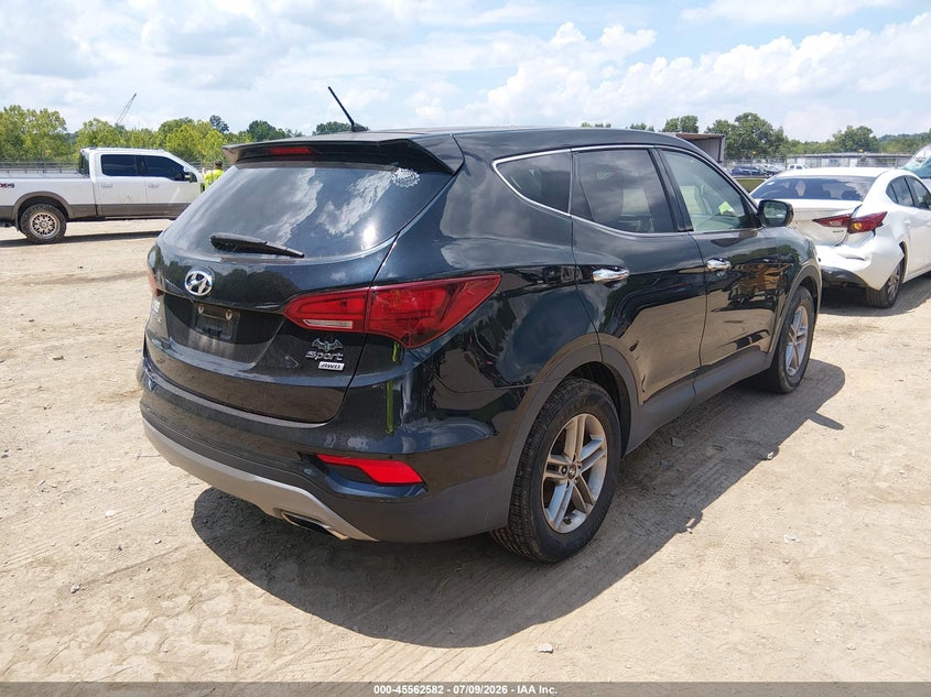 2018 Hyundai Santa fe VIN 5XYZTDLB4JG525724 IAAI salvage auction — NORMAL WEAR, Clear (Tennessee), sold $4,050 on 2026-07-15 (photo 4)