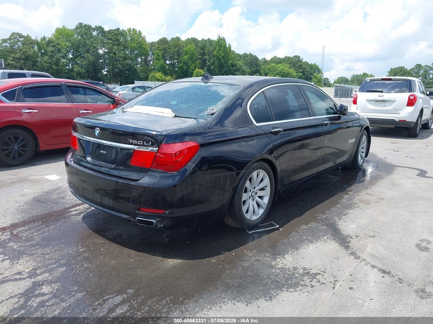 2011 BMW 7 series VIN WBAKC8C57BC432654 IAAI salvage auction — NORMAL WEAR, Clear (Florida), sold $525 on 2026-07-29 (photo 4)