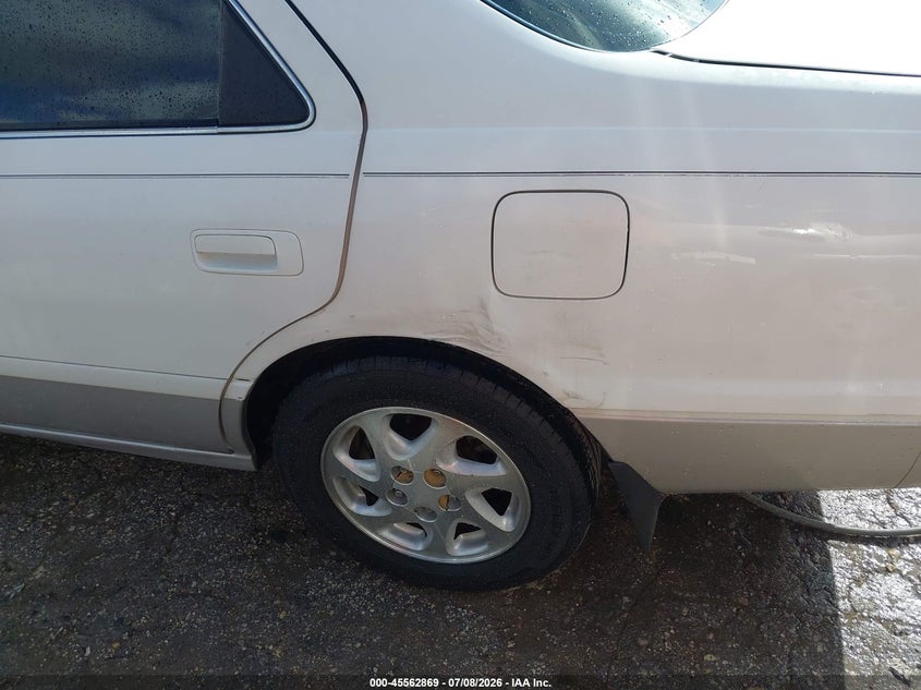 2000 Toyota Camry VIN JT2BF22K1Y0249929 IAAI salvage auction — NORMAL WEAR, Original (Texas), sold $25 on 2026-07-27 (photo 6)