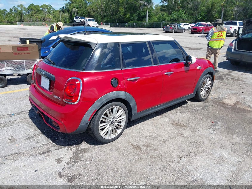 2016 Mini Hard top VIN WMWXU3C5XG2D27631 IAAI salvage auction — NORMAL WEAR, Clear (Florida), sold $600 on 2026-07-29 (photo 4)