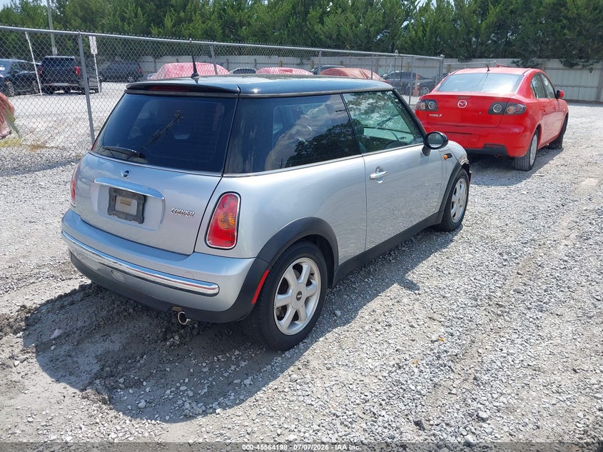 2004 Mini Cooper VIN WMWRC33404TC54519 IAAI salvage auction — ENGINE DAMAGE, Rebuildable (Florida), sold $250 on 2026-08-06 (photo 4)