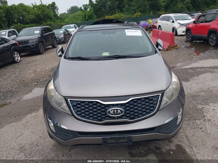 2011 Kia Sportage VIN KNDPCCA64B7168535 IAAI salvage auction — NORMAL WEAR, Clear (Maryland), sold $800 on 2026-07-23 (photo 6)