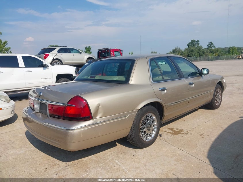 2000 Mercury Grand marquis VIN 2MEFM74W1YX714916 IAAI salvage auction — NORMAL WEAR, Clear (Missouri), sold $575 on 2026-07-21 (photo 4)