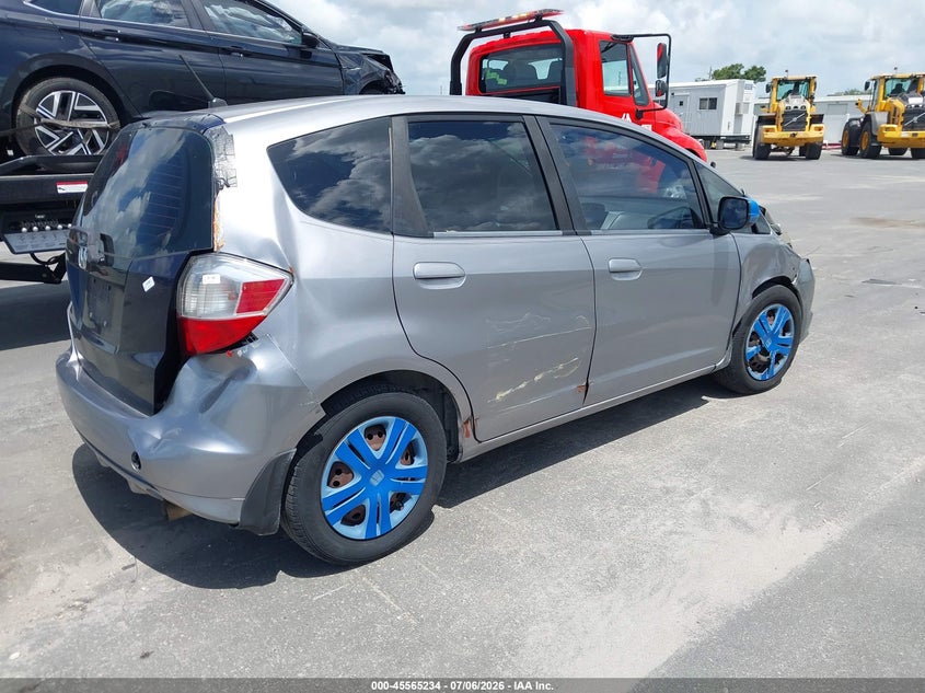 2009 Honda Fit VIN JHMGE88269S022394 IAAI salvage auction — NORMAL WEAR, Clear (Florida), sold $475 on 2026-07-29 (photo 4)