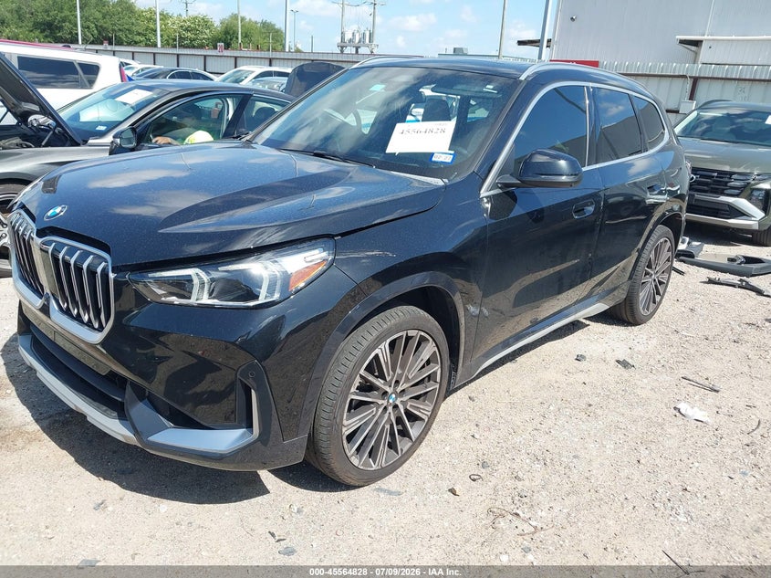 2025 BMW X1 VIN WBX73EF01S5149374 IAAI salvage auction — SIDE, Salvage Title, sold $18,000 on 2026-08-24 (photo 2)