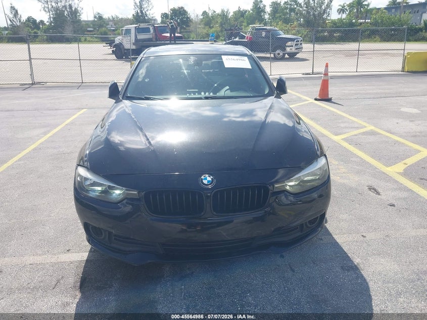 2017 BMW 3 series VIN WBA8A9C32HAC99846 IAAI salvage auction — NORMAL WEAR, Clear (Florida), sold $1,725 on 2026-07-30 (photo 6)