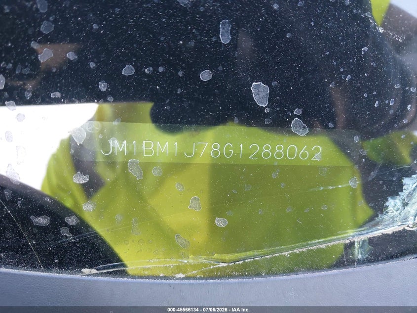 2016 Mazda 3 VIN JM1BM1J78G1288062 IAAI salvage auction — SIDE, Salvage Title, sold $1,150 on 2026-07-11 (photo 9)