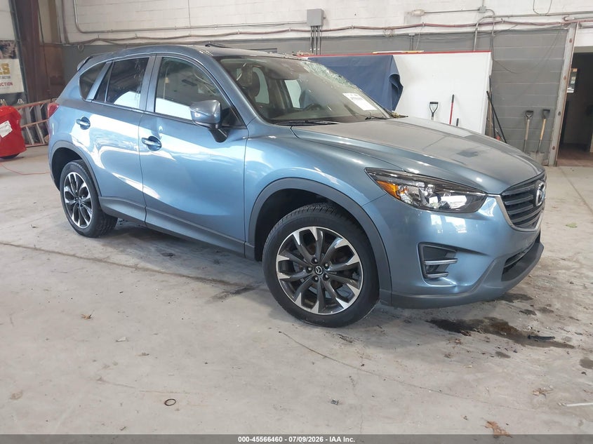 2016 Mazda Cx-5 VIN JM3KE4DY2G0713906 IAAI salvage auction — STORM DAMAGE, Salvage Title, sold $25 on 2026-07-29 (photo 1)