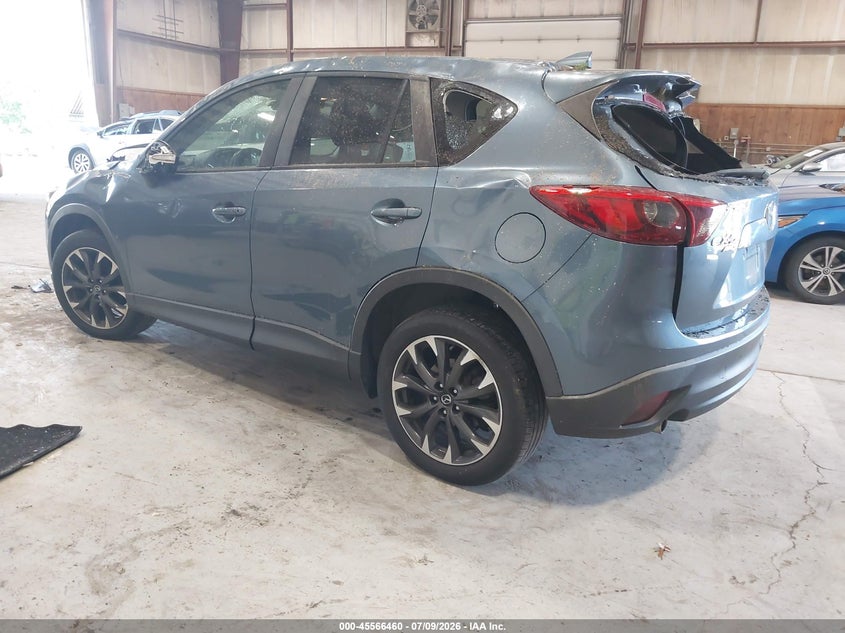 2016 Mazda Cx-5 VIN JM3KE4DY2G0713906 IAAI salvage auction — STORM DAMAGE, Salvage Title, sold $25 on 2026-07-29 (photo 3)