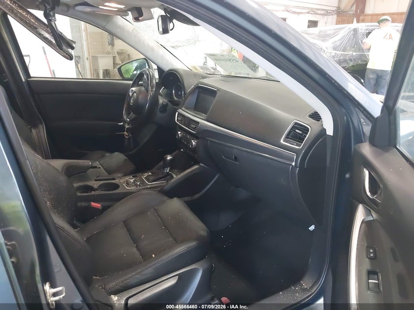 2016 Mazda Cx-5 VIN JM3KE4DY2G0713906 IAAI salvage auction — STORM DAMAGE, Salvage Title, sold $25 on 2026-07-29 (photo 5)