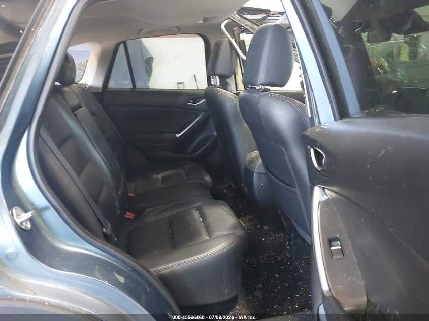 2016 Mazda Cx-5 VIN JM3KE4DY2G0713906 IAAI salvage auction — STORM DAMAGE, Salvage Title, sold $25 on 2026-07-29 (photo 8)