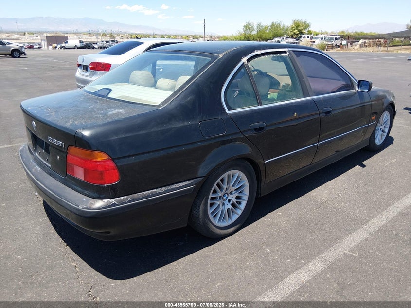 1999 BMW 5 series VIN WBADM6334XBY24948 IAAI salvage auction — NORMAL WEAR, Clear (Nevada), sold $125 on 2026-07-24 (photo 4)