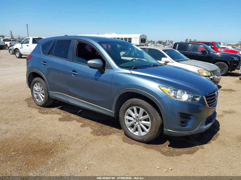 2016 Mazda Cx-5 VIN JM3KE2BYXG0763766 IAAI salvage auction — NORMAL WEAR, Salvage Title, sold $1,400 on 2026-07-13 (photo 1)