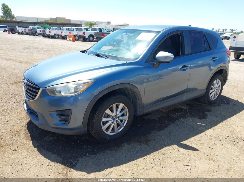 2016 Mazda Cx-5 VIN JM3KE2BYXG0763766 IAAI salvage auction — NORMAL WEAR, Salvage Title, sold $1,400 on 2026-07-13 (photo 2)