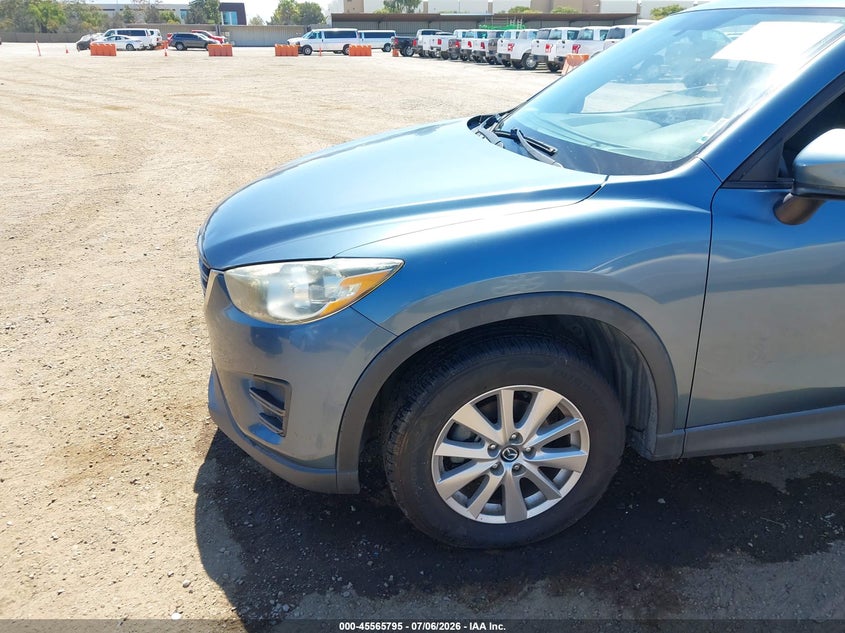2016 Mazda Cx-5 VIN JM3KE2BYXG0763766 IAAI salvage auction — NORMAL WEAR, Salvage Title, sold $1,400 on 2026-07-13 (photo 6)