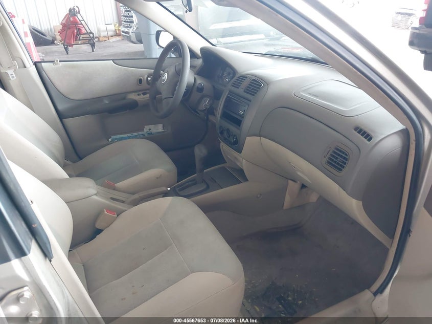 2002 Mazda Protege VIN JM1BJ225821588592 IAAI salvage auction — NORMAL WEAR, Clear (Florida), sold $25 on 2026-07-15 (photo 5)