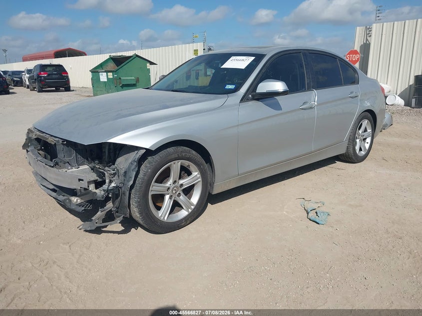 2014 BMW 3 series VIN WBA3B1G56ENT01054 IAAI salvage auction — ENGINE DAMAGE, Original (Texas), sold $900 on 2026-07-27 (photo 2)