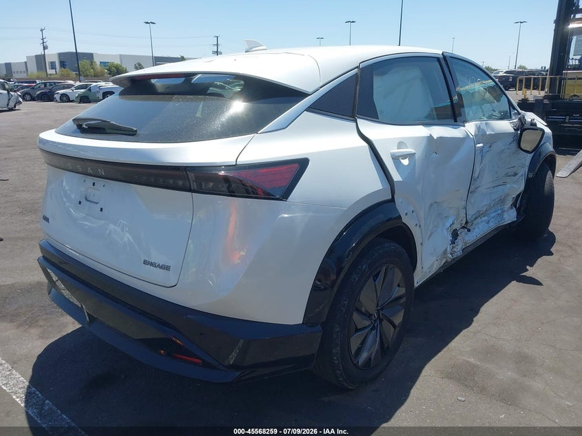 2024 Nissan Ariya VIN JN1AF0BA4RM434617 IAAI salvage auction — SIDE, Salvage Title, sold $9,300 on 2026-08-23 (photo 4)