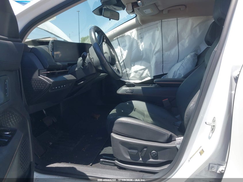 2024 Nissan Ariya VIN JN1AF0BA4RM434617 IAAI salvage auction — SIDE, Salvage Title, sold $9,300 on 2026-08-23 (photo 5)