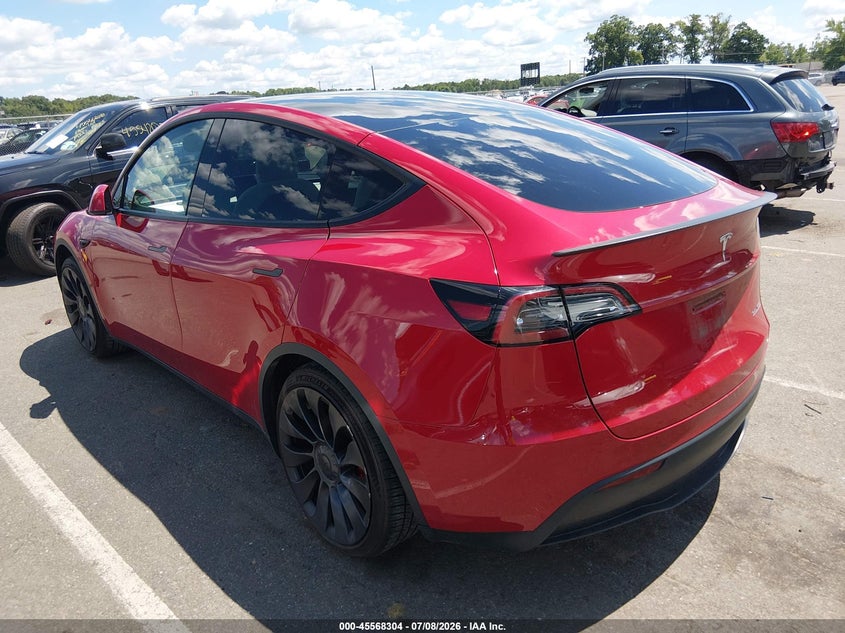 2023 Tesla Model y VIN 7SAYGDEF3PF624814 IAAI salvage auction — SIDE, Salvage Title, sold $12,400 on 2026-08-29 (photo 3)