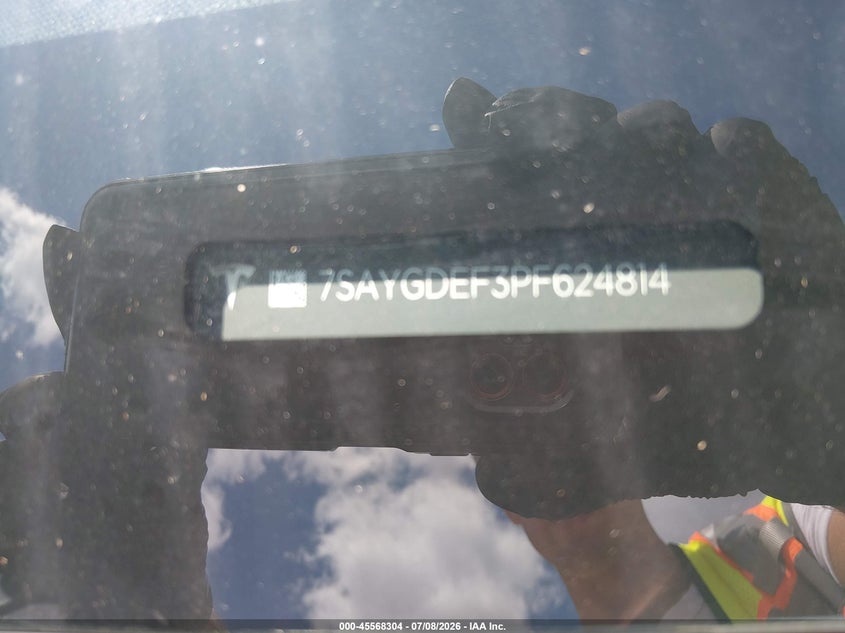 2023 Tesla Model y VIN 7SAYGDEF3PF624814 IAAI salvage auction — SIDE, Salvage Title, sold $12,400 on 2026-08-29 (photo 9)