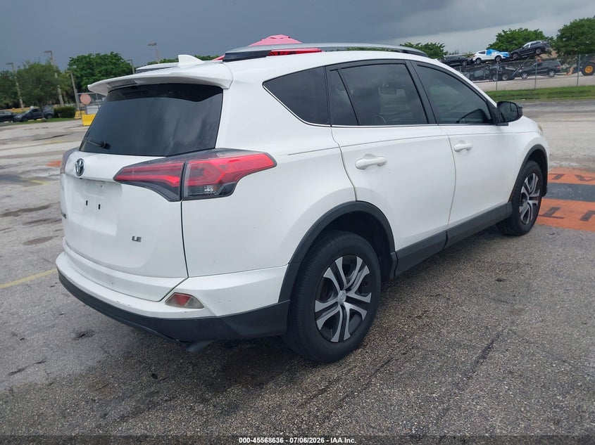 2018 Toyota Rav4 VIN JTMZFREVXJJ152121 IAAI salvage auction — NORMAL WEAR, Clear (Florida), sold $4,050 on 2026-07-23 (photo 4)