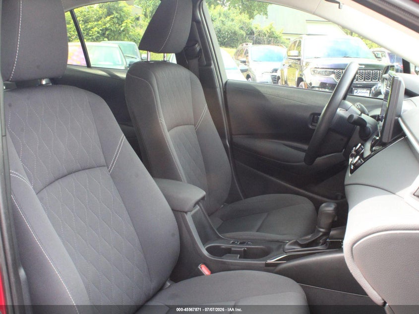 2023 Toyota Corolla VIN JTDBCMFE4PJ013249 IAAI salvage auction — NORMAL WEAR, Certificate Of Origin (Texas), sold $8,200 on 2026-07-27 (photo 5)