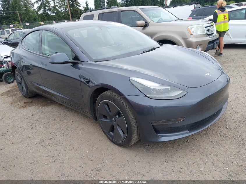 2023 Tesla Model 3 VIN 5YJ3E1EA5PF409743 IAAI salvage auction — REAR END, Bill Of Sale (Washington), sold $11,100 on 2026-07-17 (photo 1)