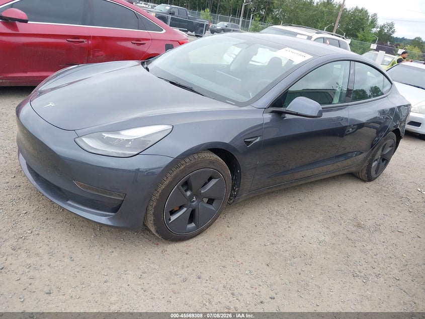 2023 Tesla Model 3 VIN 5YJ3E1EA5PF409743 IAAI salvage auction — REAR END, Bill Of Sale (Washington), sold $11,100 on 2026-07-17 (photo 2)
