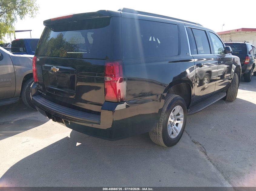 2020 Chevrolet Suburban VIN 1GNSKHKC2LR158839 IAAI salvage auction — NORMAL WEAR, Original (Texas), sold $8,950 on 2026-07-29 (photo 4)