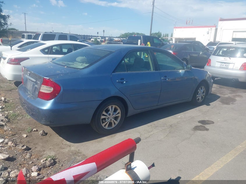 2004 Toyota Camry VIN 4T1BF30KX4U588445 IAAI salvage auction — NORMAL WEAR, Clear (Utah), sold $425 on 2026-07-18 (photo 4)