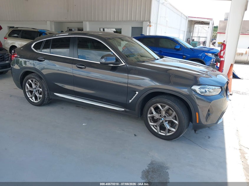 2022 BMW X4 VIN 5UX33DT05N9H43409 IAAI salvage auction — LEFT SIDE, Rebuildable (Florida), sold $25 on 2026-07-29 (photo 1)