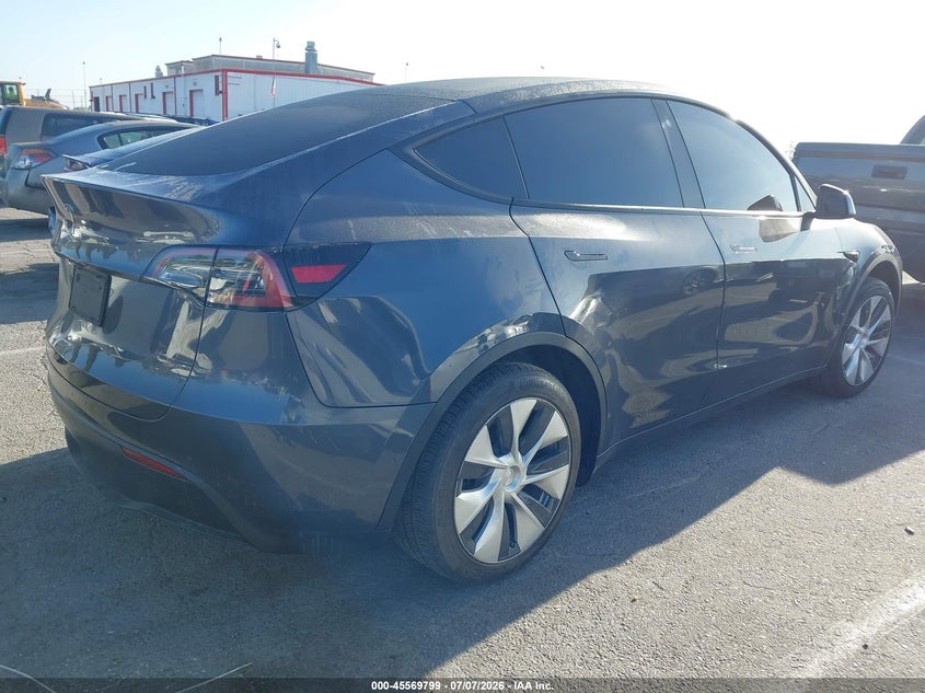 2021 Tesla Model y VIN 5YJYGAED3MF181652 IAAI salvage auction — SIDE, Wait Title, sold $9,100 on 2026-08-22 (photo 4)