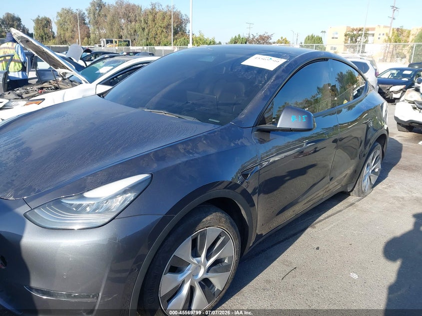 2021 Tesla Model y VIN 5YJYGAED3MF181652 IAAI salvage auction — SIDE, Wait Title, sold $9,100 on 2026-08-22 (photo 6)