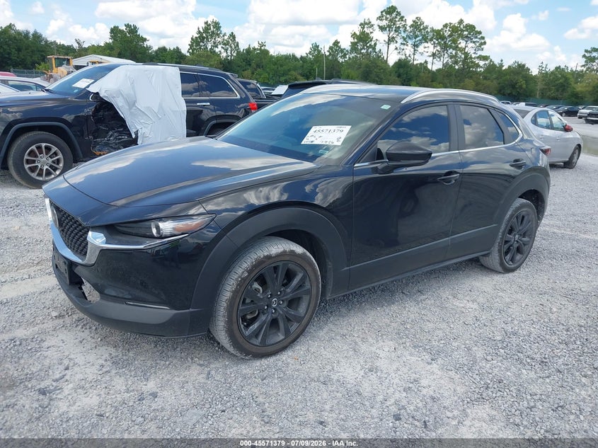 2024 Mazda Cx-30 VIN 3MVDMBBM1RM697401 IAAI salvage auction — NORMAL WEAR, Enterprise Vehicles Clear Only (Missouri), sold $12,600 on 2026-07-15 (photo 2)