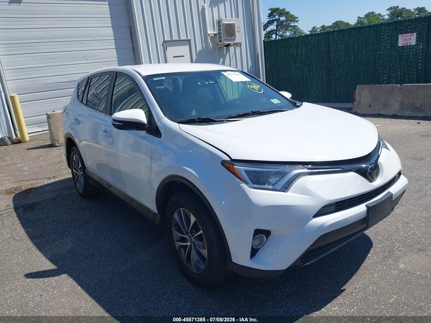 2018 Toyota Rav 4 VIN JTMRJREV0JD256954 IAAI salvage auction — NORMAL WEAR, Salvage Title, sold $2,350 on 2026-07-28 (photo 1)