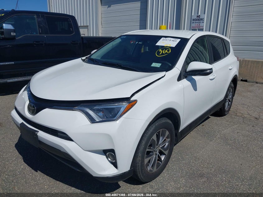 2018 Toyota Rav 4 VIN JTMRJREV0JD256954 IAAI salvage auction — NORMAL WEAR, Salvage Title, sold $2,350 on 2026-07-28 (photo 2)