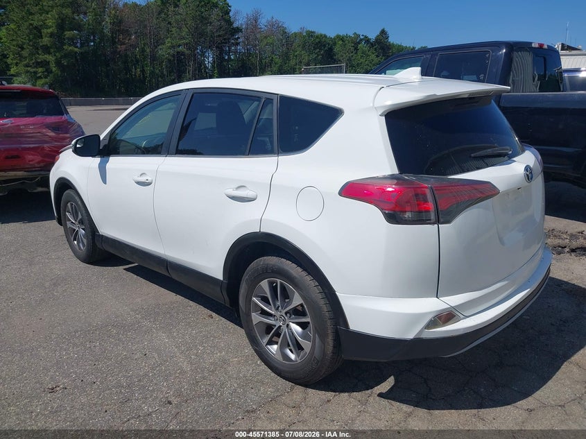 2018 Toyota Rav 4 VIN JTMRJREV0JD256954 IAAI salvage auction — NORMAL WEAR, Salvage Title, sold $2,350 on 2026-07-28 (photo 3)