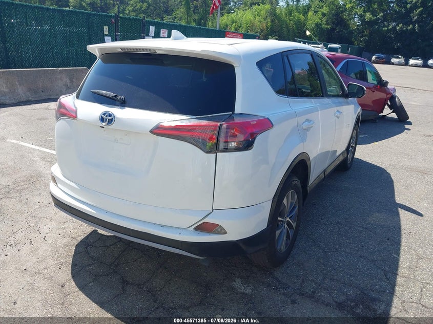 2018 Toyota Rav 4 VIN JTMRJREV0JD256954 IAAI salvage auction — NORMAL WEAR, Salvage Title, sold $2,350 on 2026-07-28 (photo 4)