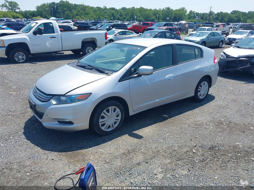 2010 Honda Insight VIN JHMZE2H51AS030987 IAAI salvage auction — NORMAL WEAR, Clear (Delaware), sold $200 on 2026-07-30 (photo 2)