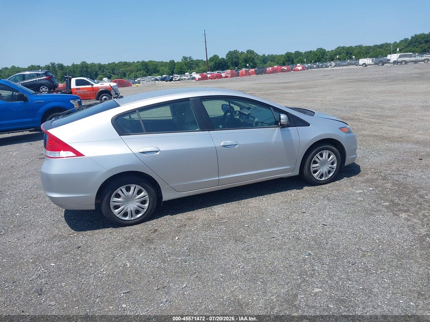 2010 Honda Insight VIN JHMZE2H51AS030987 IAAI salvage auction — NORMAL WEAR, Clear (Delaware), sold $200 on 2026-07-30 (photo 4)