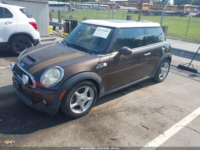 2010 Mini Cooper VIN WMWMF7C53ATW88489 IAAI salvage auction — SIDE, Rebuildable (Florida), sold $1,450 on 2026-07-16 (photo 2)