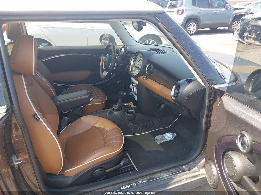 2010 Mini Cooper VIN WMWMF7C53ATW88489 IAAI salvage auction — SIDE, Rebuildable (Florida), sold $1,450 on 2026-07-16 (photo 5)