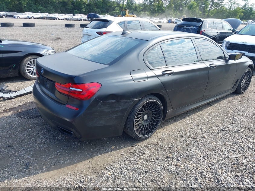 2017 BMW 7er VIN WBA7F2C57HG421682 IAAI salvage auction — FRONT & REAR, Salvage Title, sold $5,200 on 2026-08-18 (photo 4)