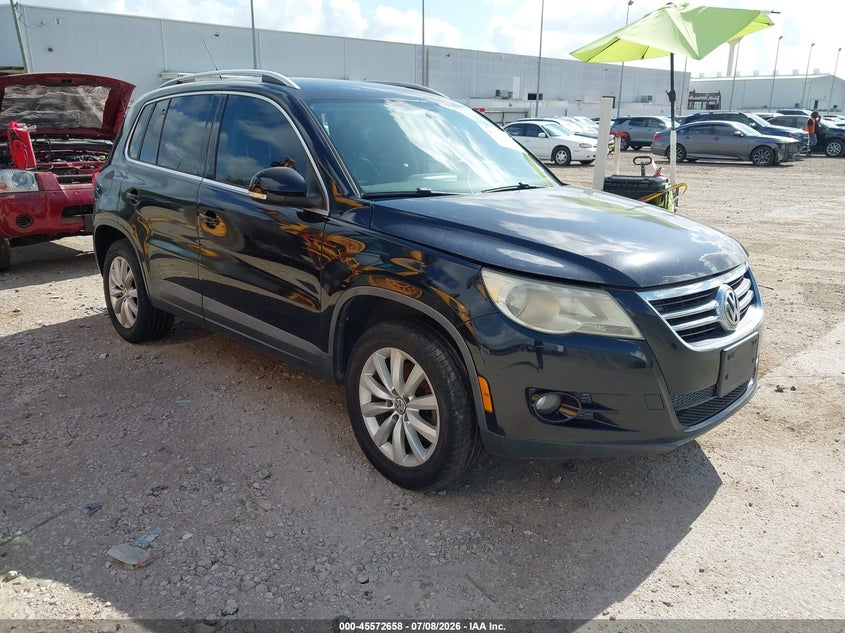 2011 Volkswagen Tiguan VIN WVGAV7AX8BW558071 IAAI salvage auction — SIDE, Salvage (Texas), sold $300 on 2026-08-06 (photo 1)