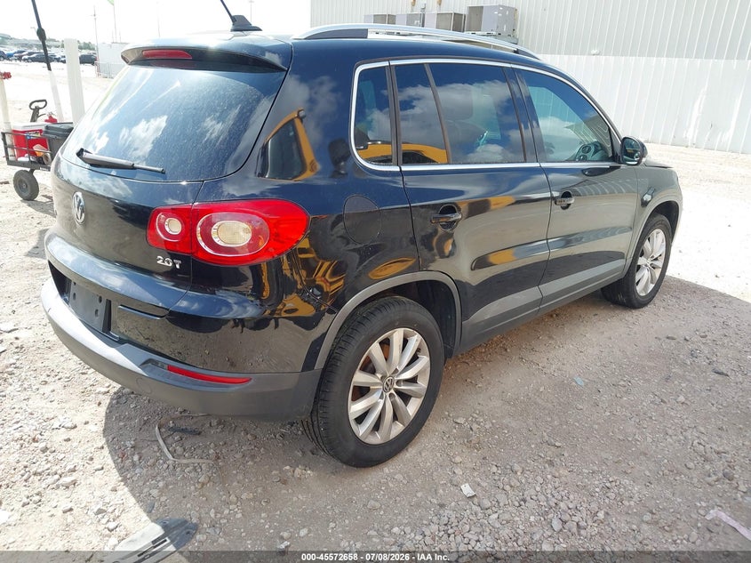 2011 Volkswagen Tiguan VIN WVGAV7AX8BW558071 IAAI salvage auction — SIDE, Salvage (Texas), sold $300 on 2026-08-06 (photo 4)