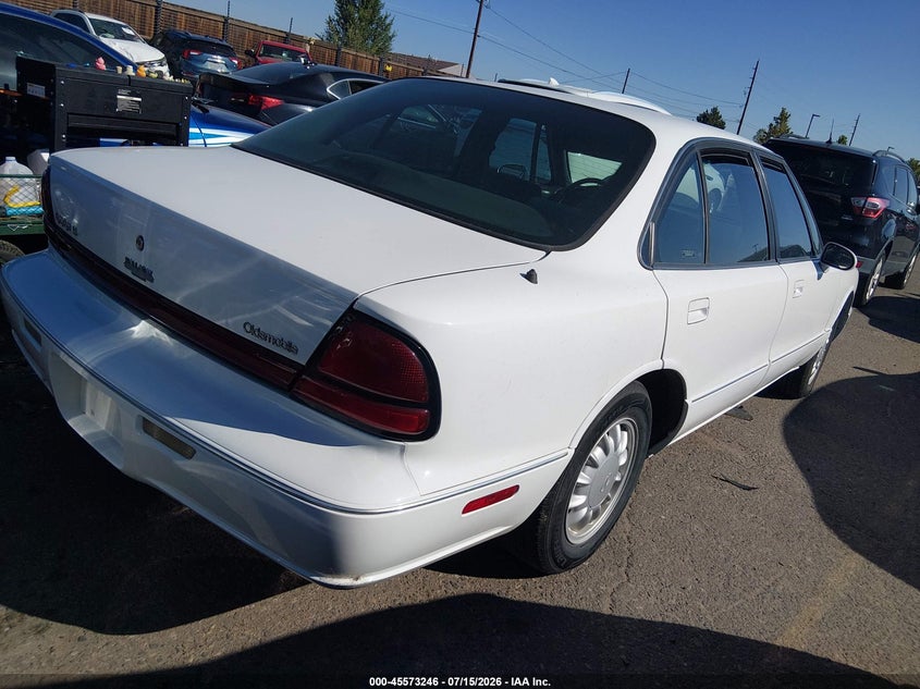 1998 Oldsmobile .88 VIN 1G3HN52K4W4823242 IAAI salvage auction — NORMAL WEAR, Clear (Wyoming), sold $175 on 2026-07-28 (photo 4)